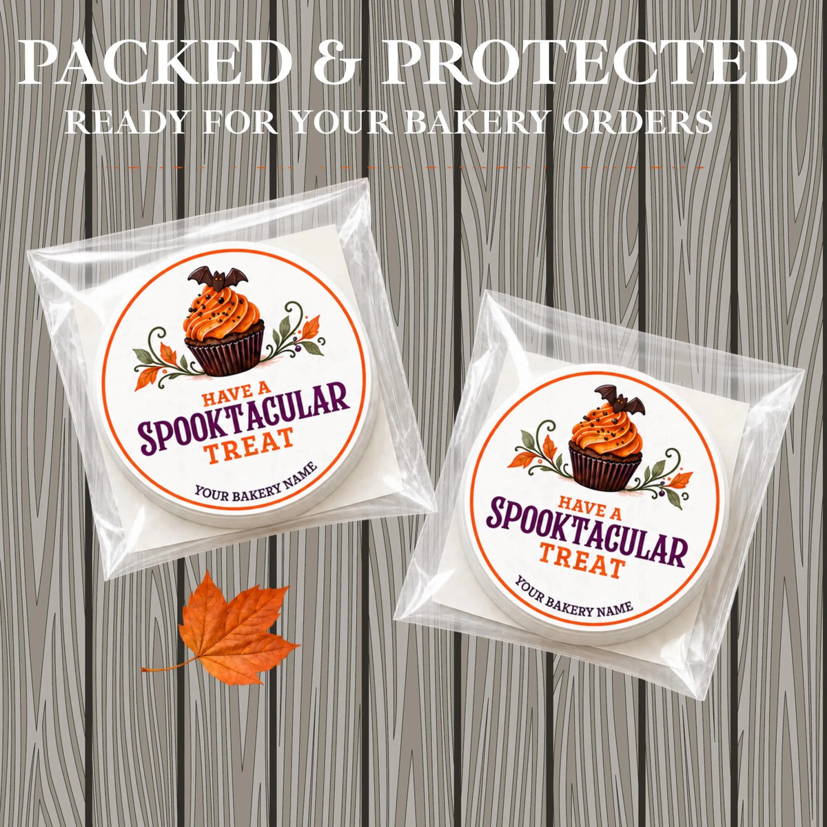 Two packaged round treats in clear cellophane bags with printed Halloween-themed labels reading 'HAVE A Spooktacular TREAT' and a cupcake illustration, shown on a gray wood plank background with large promotional text at the top.