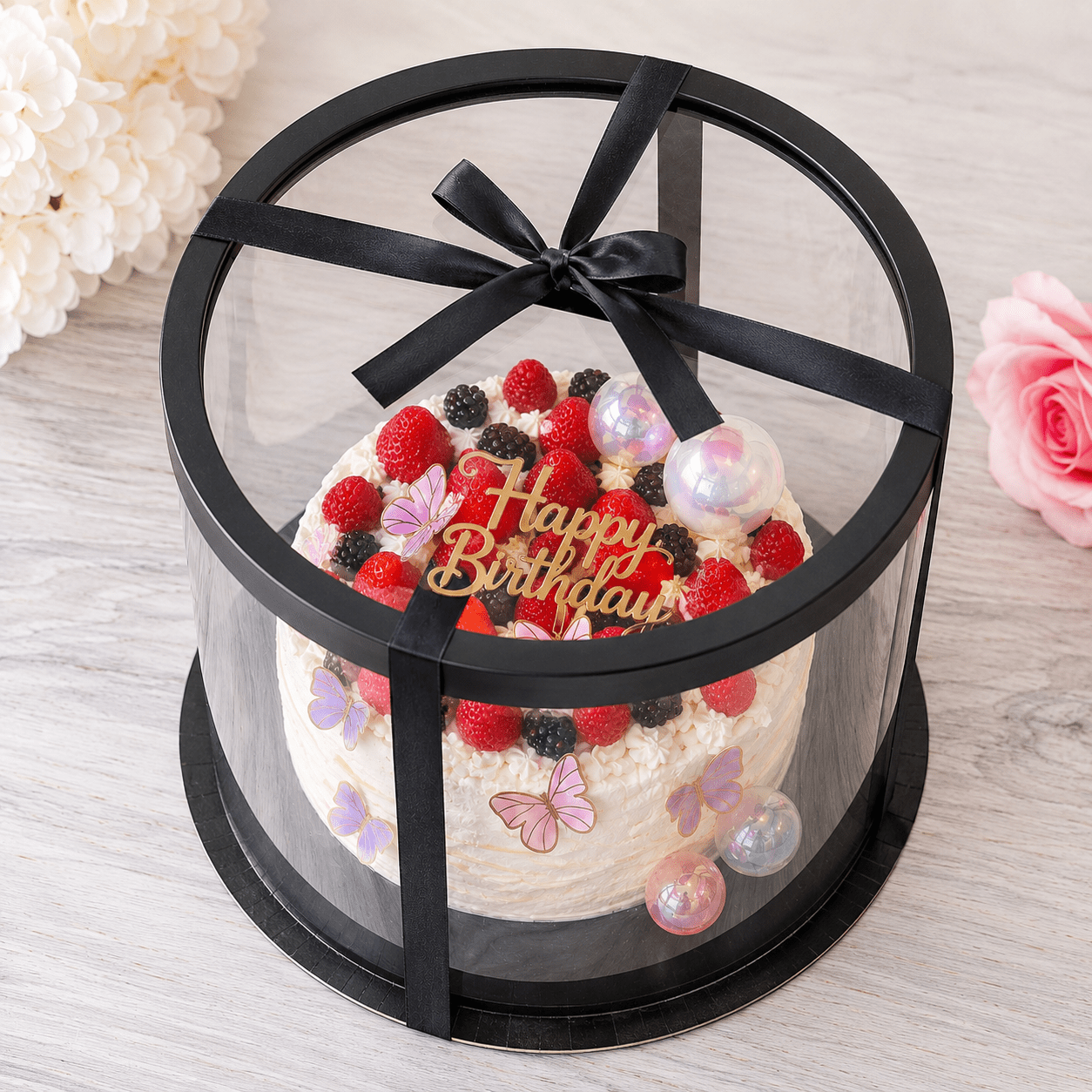 Transparent round cake display box with white top and bottom, measuring 12 inches wide by 10 inches tall