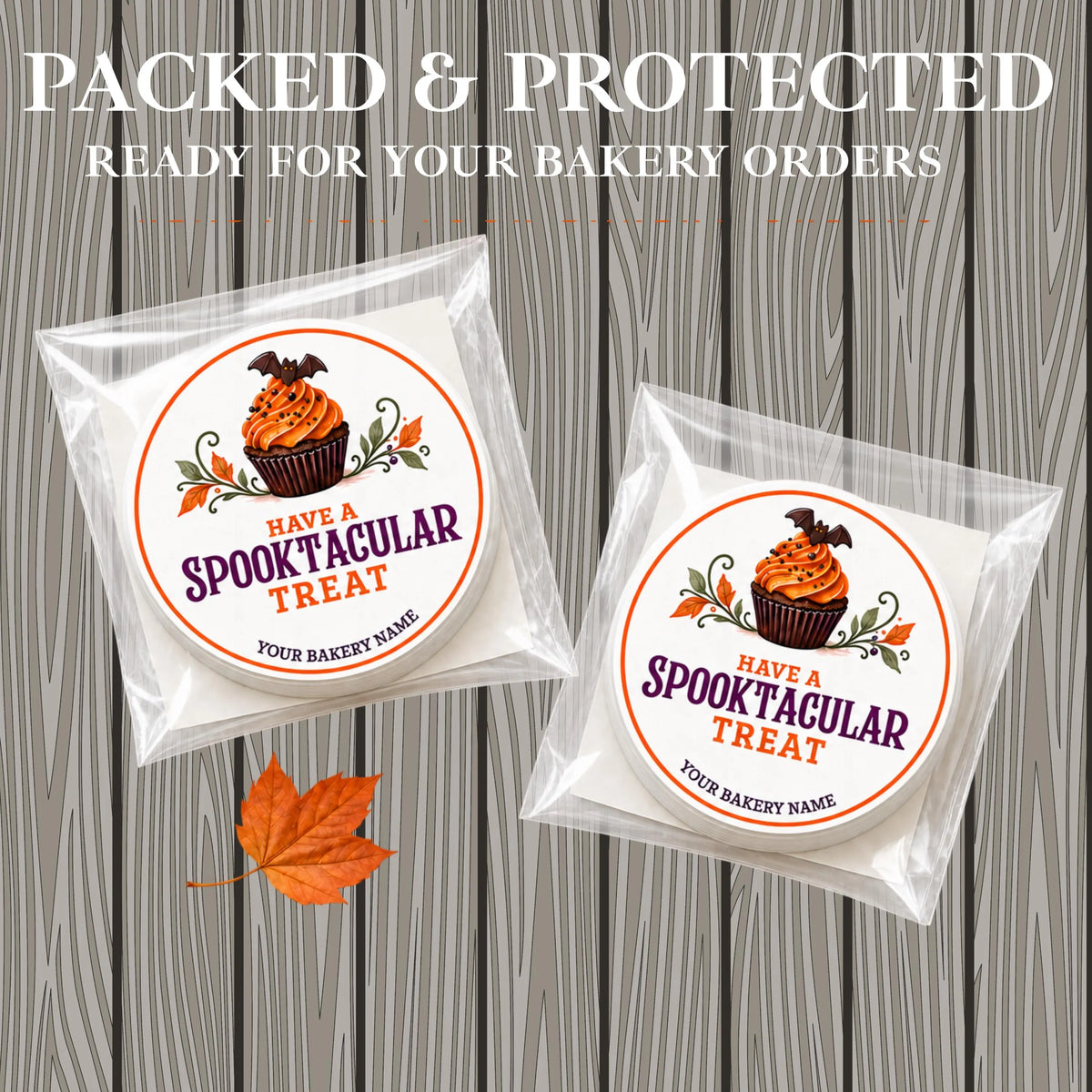 Two packaged round treats in clear cellophane bags with printed Halloween-themed labels reading 'HAVE A Spooktacular TREAT' and a cupcake illustration, shown on a gray wood plank background with large promotional text at the top.